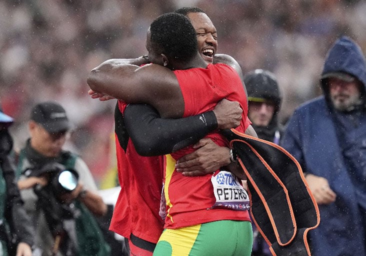 CARIBBEAN CELEBRATION: Gold medallist Trinidad and Tobago’s Keshorn  Walcott, left, embraces silver medallist,  Grenada’s Anderson Peters, after  competing in the Men’s javelin throw final at the World Athletics Championships  in Tokyo, Japan, Thursday. —Photo: AP (Image obtained at trinidadexpress.com)